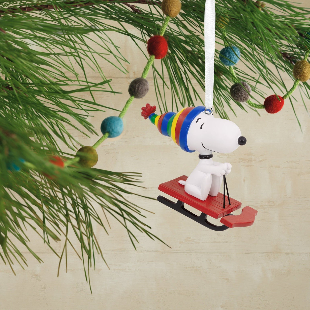 Collectable Peanuts Snoopy On Sled Ornament - Planet Toys