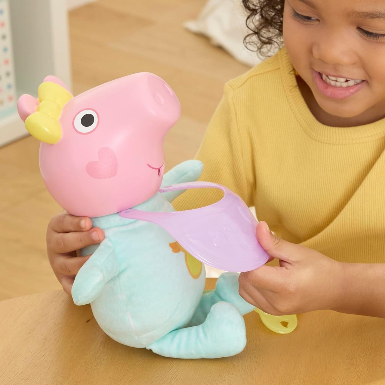 Peppa Pig Interactive Oinks & Snuggles Baby Evie Doll - Planet Toys